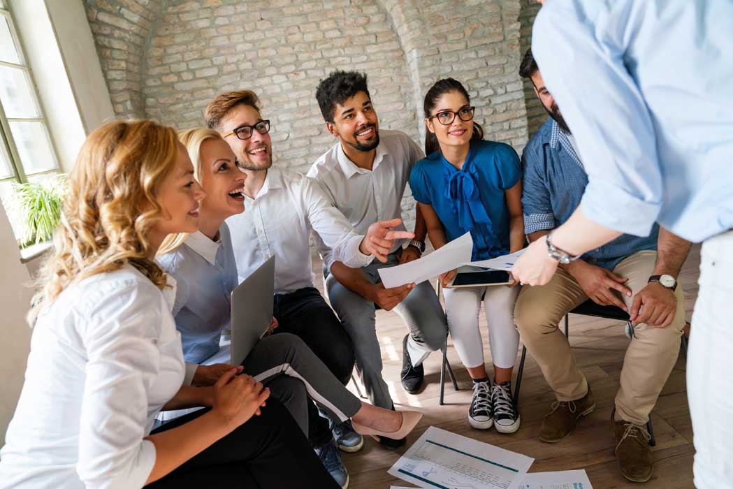 Diverse business people in office during brainstorming while discussing ideas for their new project.
