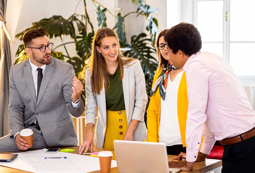 Group of business people working in office.