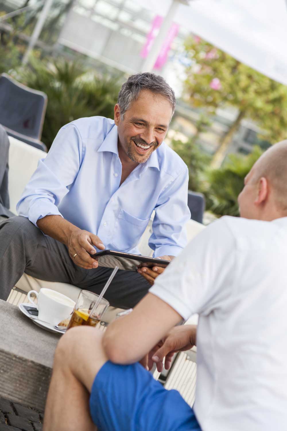 Business man offering leadership advice at a retreat location